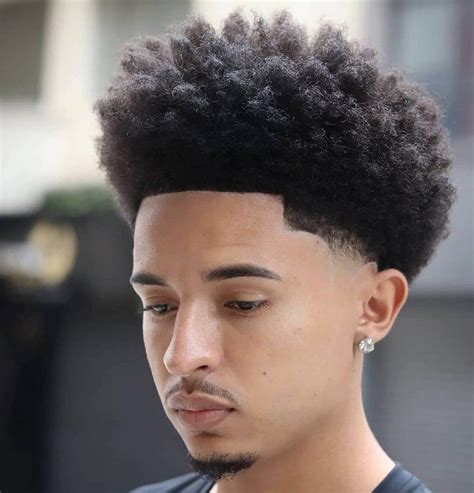 The barber will use the clippers to decide which is the most flattering length. . Afro lineup and taper